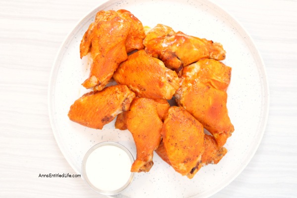 Crispy Oven Baked Chicken Wings Recipe | Buffalo Style. These oven-baked wings are crispy and delicious. They are juicy and flavorful without being overwhelmingly spicy.