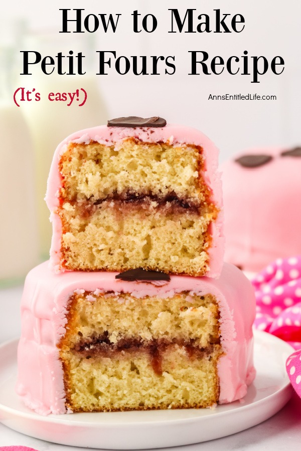 Two, stacked, pink, heart shaped petit fours on white plates cut open to display the inside.