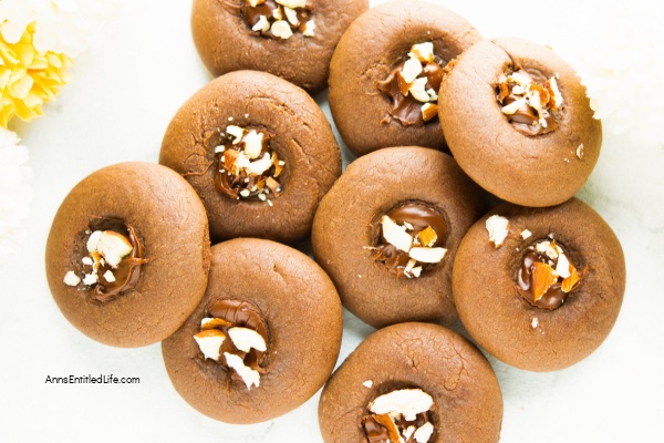 Easy Nutella® Thumbprint Cookies Recipe. Indulge in the delectable delight of Nutella® Thumbprint Cookies with this easy-to-follow recipe. These cookies are a perfect blend of rich Nutella® spread and buttery cookie dough, creating a heavenly treat for any occasion.