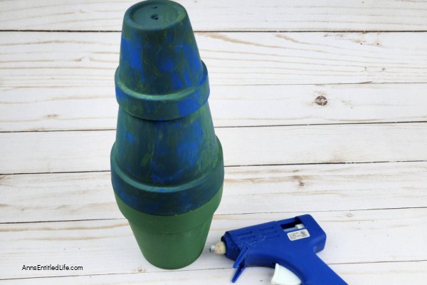 Flower Pot Gnome DIY. Craft a flower pot gnome with this easy step-by-step tutorial. Transform your garden decor with this delightful DIY craft.