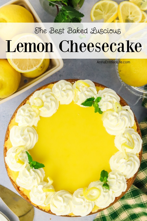 An overhead view of a homemade lemon cheesecake. There are lemons in a basket in the upper left, cut lemon slices in the upper right.