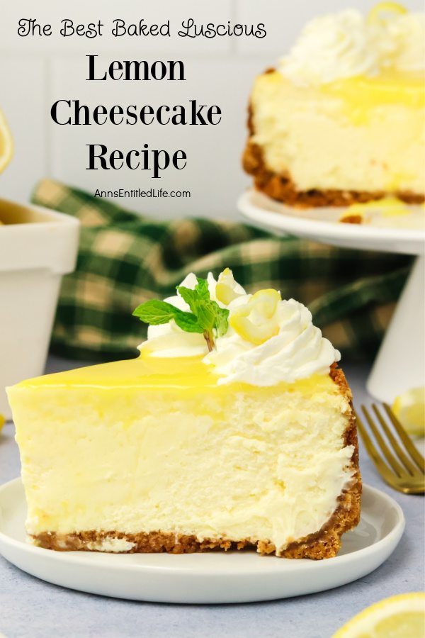 An piece of homemade lemon cheesecake sits on a white plate, the rest of the cheesecake is in the upper right.