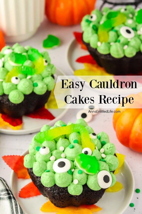 Close up of three cauldron cakes on white plates