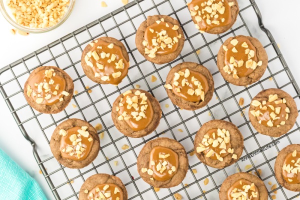 Easy Snickers Stuffed Cookie Cups Recipe. Discover how to make easy Snickers stuffed cookie cups. This simple recipe creates delicious cookie cups filled with your favorite candy bar for a perfect sweet treat.