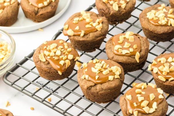 Easy Snickers Stuffed Cookie Cups Recipe. Discover how to make easy Snickers stuffed cookie cups. This simple recipe creates delicious cookie cups filled with your favorite candy bar for a perfect sweet treat.