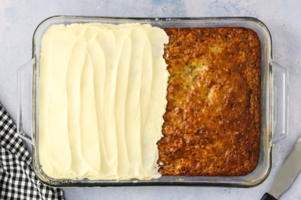 Banana Cake Recipe | Easy & Moist with Cream Cheese Frosting. Bake a delicious, moist banana cake topped with smooth cream cheese frosting. This easy recipe is perfect for using ripe bananas and makes a great dessert or snack.