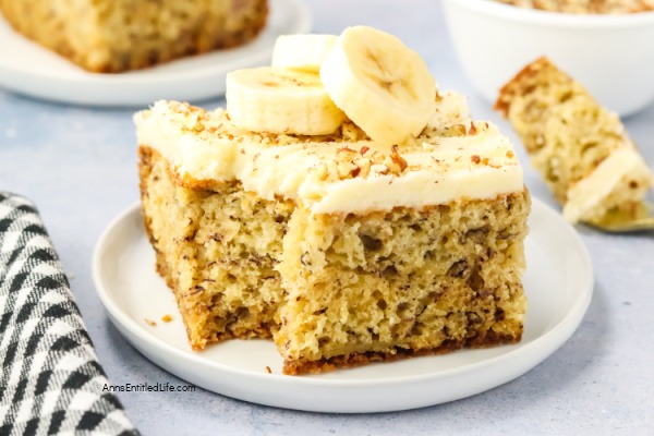 Banana Cake Recipe | Easy & Moist with Cream Cheese Frosting. Bake a delicious, moist banana cake topped with smooth cream cheese frosting. This easy recipe is perfect for using ripe bananas and makes a great dessert or snack.