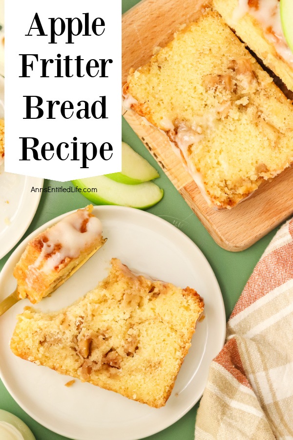 An overhead view of a piece of apple fritter bread on a white plate, the rest of the loaf is in the upper right.