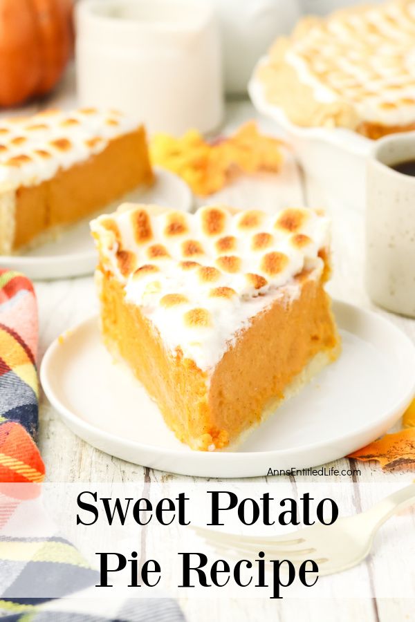 A piece of sweet potato pie with mini marshmallow topping on a white plate, a second pie is in the upper left, the rest of the pie is in the upper right