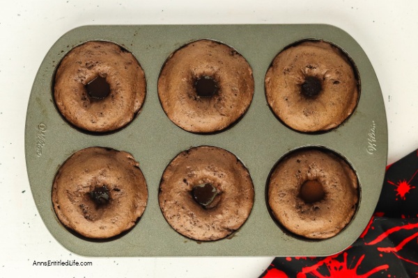 Homemade Monster Donuts Recipe for Halloween Treats. With this easy donut recipe, you can make fun and spooky monster donuts at home. Perfect for Halloween parties, these colorful treats are a hit with kids and adults alike.