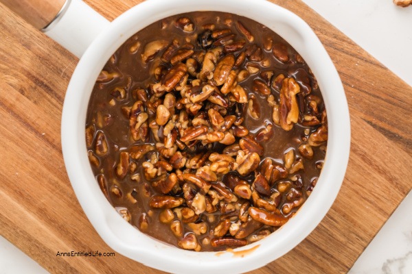 Pecan Pie Cheesecake Recipe: Creamy and Delicious Pecan Pie Cheesecake Recipe: Creamy and Delicious. Try this easy pecan pie cheesecake recipe for a delicious dessert that combines creamy cheesecake and sweet and crunchy pecan pie topping in every bite.