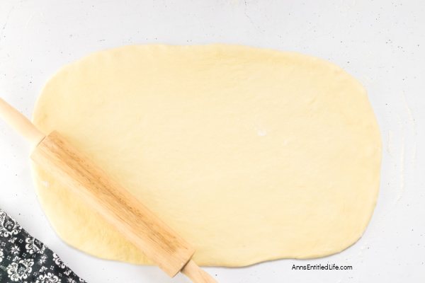 King Cake Recipe: Easy Homemade Mardi Gras Dessert. Make a classic king cake with this simple recipe for Mardi Gras. Includes ingredients list, step-by-step directions, and baking tips for a tasty, festive dessert.