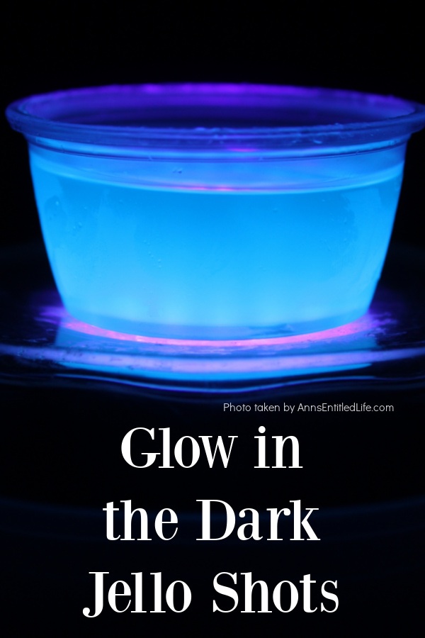 Glow in the Dark Jello Shots a glowing blue jello shot against a dark background