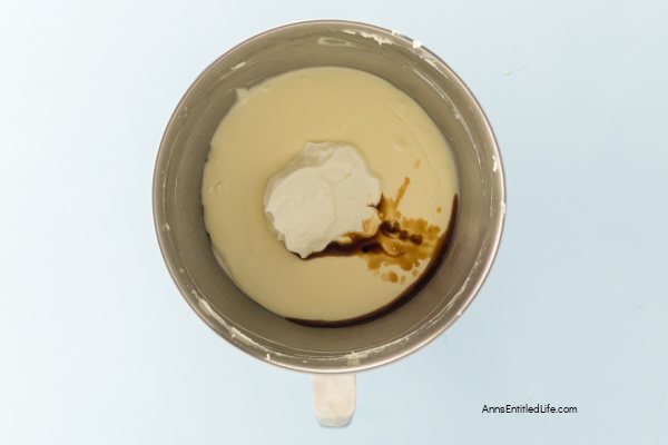 Carrot Cake Cheesecake Recipe - Moist & Creamy Dessert. This carrot cake cheesecake recipe layers moist spiced carrot cake with rich, creamy cheesecake. Topped with cream cheese frosting for the perfect Easter or anytime treat.