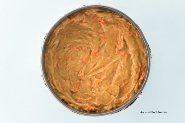 Carrot Cake Cheesecake Recipe - Moist & Creamy Dessert. This carrot cake cheesecake recipe layers moist spiced carrot cake with rich, creamy cheesecake. Topped with cream cheese frosting for the perfect Easter or anytime treat.