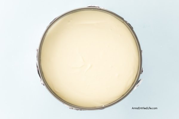 Carrot Cake Cheesecake Recipe - Moist & Creamy Dessert. This carrot cake cheesecake recipe layers moist spiced carrot cake with rich, creamy cheesecake. Topped with cream cheese frosting for the perfect Easter or anytime treat.