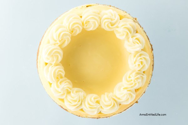 Carrot Cake Cheesecake Recipe - Moist & Creamy Dessert. This carrot cake cheesecake recipe layers moist spiced carrot cake with rich, creamy cheesecake. Topped with cream cheese frosting for the perfect Easter or anytime treat.