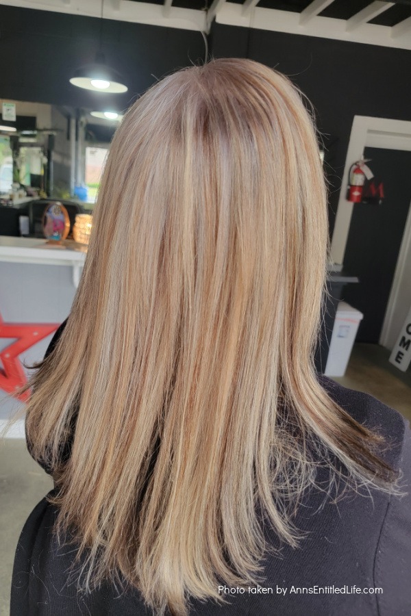 A woman (me) with long hair of many color shades.