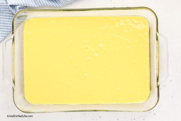 Boston Cream Pie Poke Cake Recipe - Easy & Delicious. Turn a simple cake mix into this irresistible Boston cream pie poke cake. Holes filled with creamy vanilla pudding, finished with smooth chocolate topping. Quick, make-ahead dessert everyone loves.