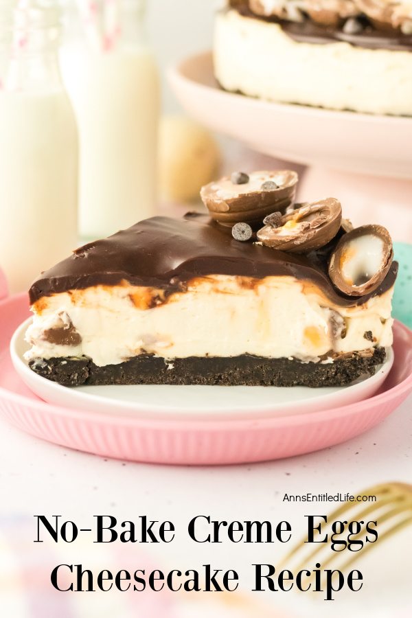 No-Bake Creme Eggs Cheesecake Recipe A piece of creme egg cheesecake is set on a white plate (that is set on a pink plate), the rest of the cheesecake is on a serving platter in the upper right