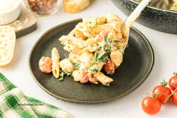 Creamy Tuscan Chicken Pasta Recipe - Easy 30-Minute Dinner. Creamy Tuscan chicken pasta with tender chicken, cherry tomatoes, spinach, garlic, and Parmesan in a rich sauce. Quick one-pan Italian-inspired meal ready in 30 minutes for weeknight dinners.