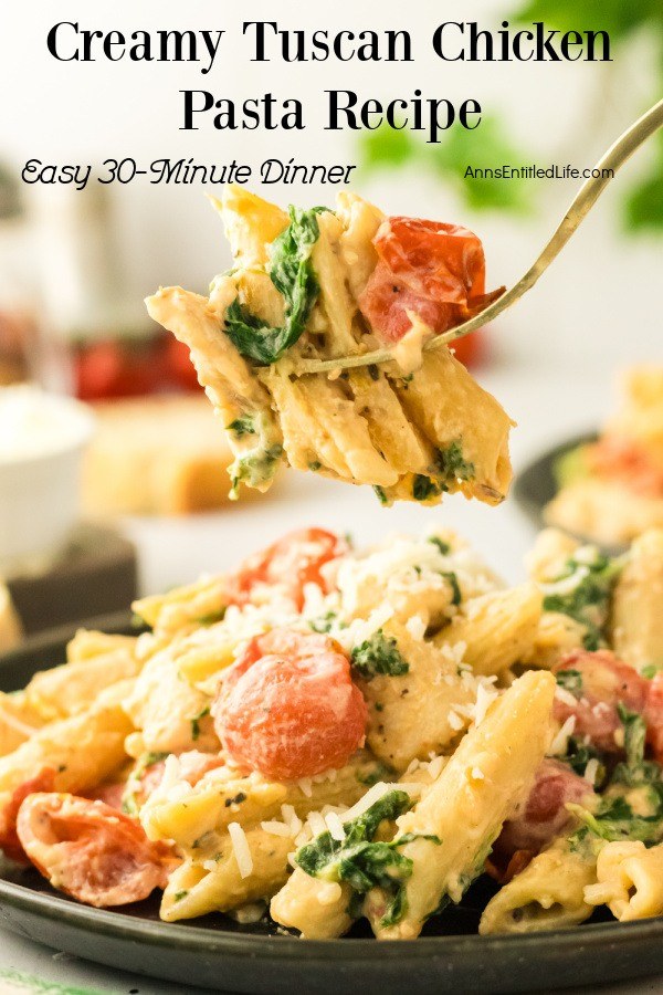 A forkful of creamy Tuscan chicken is being lifted from the plate below.