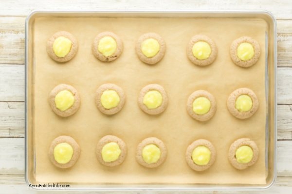 Thumbprint Lemon Cookies Recipe | Easy Zesty Treat. Bake soft buttery thumbprint lemon cookies filled with bright, tangy lemon curd. This easy homemade recipe creates perfect bite-sized treats for holidays, tea time, or everyday snacking. Simple ingredients and step-by-step instructions for fresh bakery-style results.