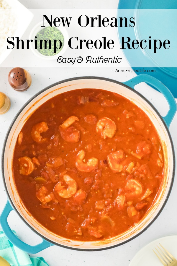 Overhead image of a pot of shrimp creole, the lid is in the upper right, some spices in the upper left