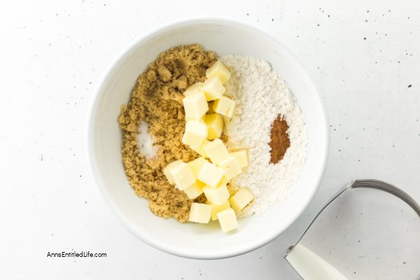 Irish Apple Cake Recipe | Easy, Moist, Spiced Apple Cake with Whiskey Glaze. Discover this Irish Apple Cake recipe; a moist, tender farmhouse classic packed with tart apples, warm spices, crunchy struesel topping completed with a whiskey glaze. Perfect for tea time or any cozy gathering.