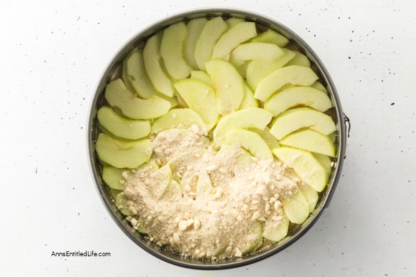 Irish Apple Cake Recipe | Easy, Moist, Spiced Apple Cake with Whiskey Glaze. Discover this Irish Apple Cake recipe; a moist, tender farmhouse classic packed with tart apples, warm spices, crunchy struesel topping completed with a whiskey glaze. Perfect for tea time or any cozy gathering.