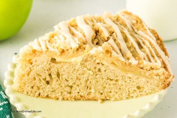 Irish Apple Cake Recipe | Easy, Moist, Spiced Apple Cake with Whiskey Glaze. Discover this Irish Apple Cake recipe; a moist, tender farmhouse classic packed with tart apples, warm spices, crunchy struesel topping completed with a whiskey glaze. Perfect for tea time or any cozy gathering.