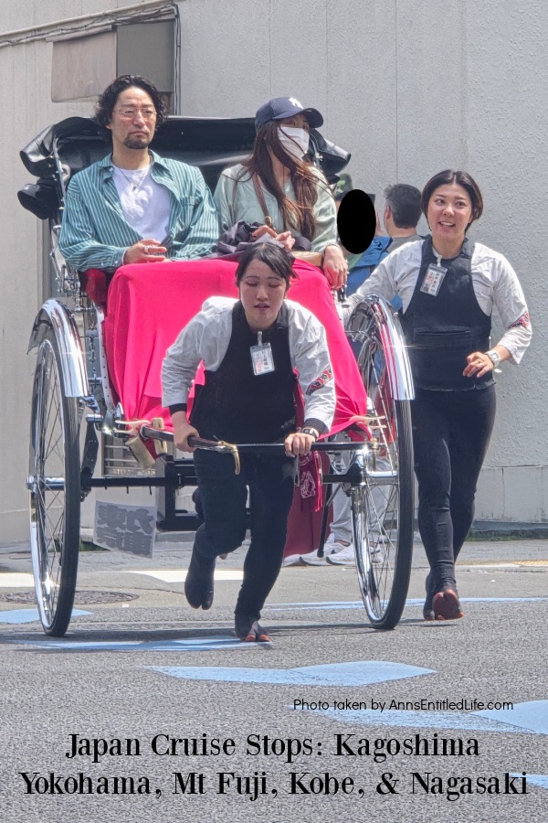 A rickshaw being pulled by two Japanese girls in Tokyo,Japan.